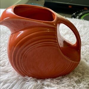 Fiestaware persimmon disc pitcher